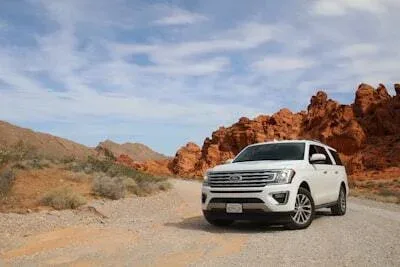 4x4 SUV driving on a desert off-road track in the UAE